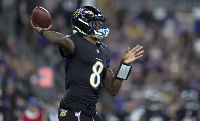 Baltimore Ravens quarterback Lamar Jackson throws a pass against the Detroit Lions during the second half of an NFL football game Monday, Sept. 22, 2025, in Baltimore. (AP Photo/Stephanie Scarbrough)
