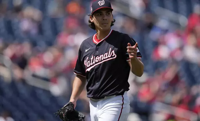 Washington Nationals starting pitcher Andrew Alvarez gestures after throwing to the Miami Marlins during the third inning of a baseball game at Nationals Park, Monday, Sept. 1, 2025, in Washington. (AP Photo/Jess Rapfogel)