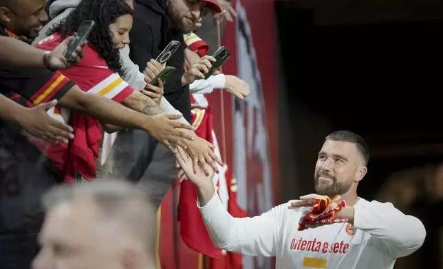 Kansas City Chiefs tight end Travis Kelce arrives an NFL football game between the Kansas City Chiefs and the Los Angeles Chargers, Friday, Sept. 5, 2025, in Sao Paulo. (AP Photo/Fernando Llano)