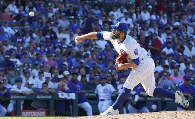 Chicago Cubs pitcher Andrew Kittredge (59) throws the ball against the Tampa Bay Rays during the ninth inning of a baseball game Sunday, Sept. 14, 2025, in Chicago. (AP Photo/David Banks)