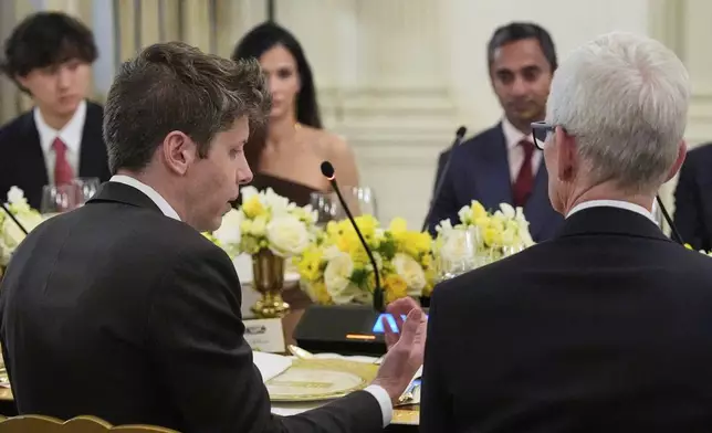 OpenAI CEO Sam Altman speaks during a dinner with President Donald Trump in the State Dinning Room of the White House, Thursday, Sept. 4, 2025, in Washington. (AP Photo/Alex Brandon)