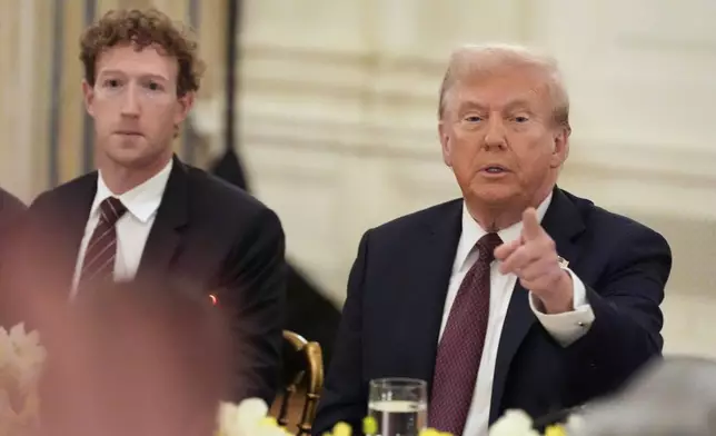 Facebook CEO Mark Zuckerberg listens as President Donald Trump speaks during a dinner in the State Dinning Room of the White House, Thursday, Sept. 4, 2025, in Washington. (AP Photo/Alex Brandon)