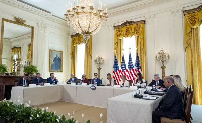 First lady Melania Trump, center, speaks during a meeting of the White House Task Force on Artificial Intelligence Education in the East Room of the White House, Thursday, Sept. 4, 2025, in Washington. (AP Photo/Alex Brandon)