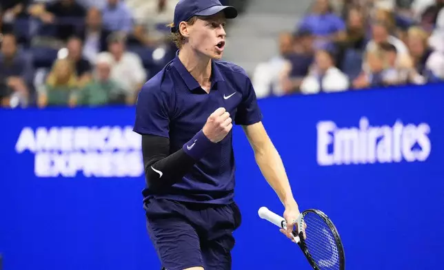 Jannik Sinner, of Italy, reacts after scoring a point against Felix Auger-Aliassime, of Canada, during the men's singles semifinals of the U.S. Open tennis championships, Friday, Sept. 5, 2025, in New York. (AP Photo/Yuki Iwamura)