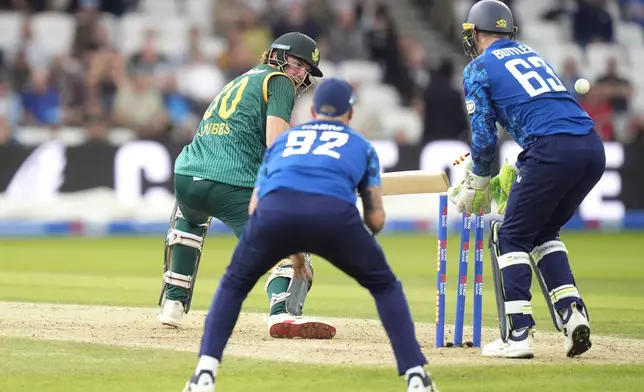 South Africa's Tristan Stubbs reacts after being bowled out by England's Adil Rashid during the One Day International Series cricket match between England and South Africa at Headingley, Leeds, England, Tuesday, Sept. 2, 2025. (Danny Lawson/PA via AP)