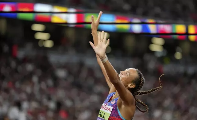 United States' Anna Hall crosses the finish line in the heptathlon 800 meters at the World Athletics Championships in Tokyo, Saturday, Sept. 20, 2025. (AP Photo/Matthias Schrader)