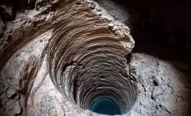 FILE PHOTO GALLERY - This hole was cut into the Aktun Tuyul cave system, made by massive metal drills to introduce a steel pillar filled with concrete that will be used to support a part of the Maya Train track, on the outskirts of Playa del Carmen, Mexico, March 1, 2024. (AP Photo/Rodrigo Abd)