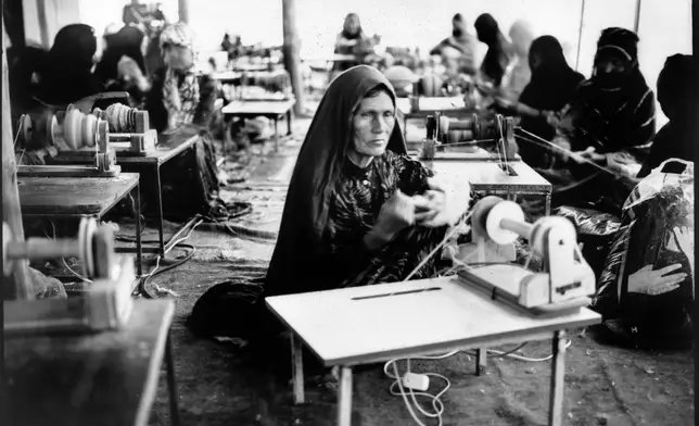 FILE PHOTO GALLERY - Nikbakht, 70, works in a carpet factory in Kabul, Afghanistan, May 29, 2023. (AP Photo/Rodrigo Abd, File)