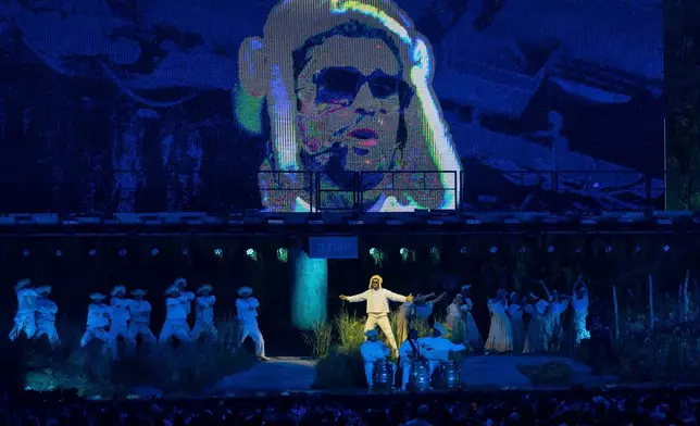 FILE - Bad Bunny performs during the final concert of his summer residency in his homeland at the Coliseo de Puerto Rico Jose Miguel Agrelot, in San Juan, Puerto Rico, Sept. 20, 2025. (AP Photo/Alejandro Granadillo, File)