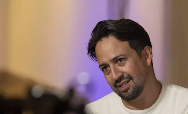 Lin-Manuel Miranda is interviewed during the closing event of the Flamboyan Arts Fund at the Museum of Contemporary Art in San Juan, Puerto Rico, Saturday, Sept. 13, 2025. (AP Photo/Alejandro Granadillo)