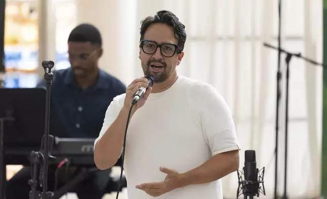 Lin-Manuel Miranda speaks to attendees during the closing event of the Flamboyan Arts Fund at the Museum of Contemporary Art in San Juan, Puerto Rico, Saturday, Sept. 13, 2025. (AP Photo/Alejandro Granadillo)