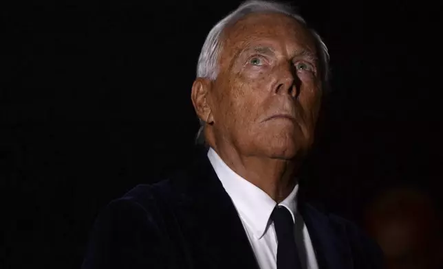 FILE - Italian designer Giorgio Armani attends his Haute Couture Fall Winter 2016/17 collection show in Moscow, Russia, April 14, 2016. (AP Photo/ Pavel Bednyakov, File)