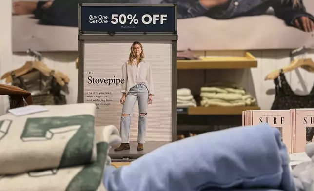 An ad for jeans is seen at American Eagle Outfitters, Thursday, Sept. 4, 2025, in Bellevue, Wash. (AP Photo/Lindsey Wasson)