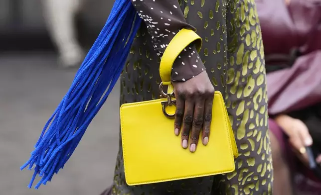 A model wears a creation part of the Ferragamo women's Spring-Summer 2026 collection, that was presented in Milan, Italy, Saturday, Sept. 27, 2025. (AP Photo/Luca Bruno).