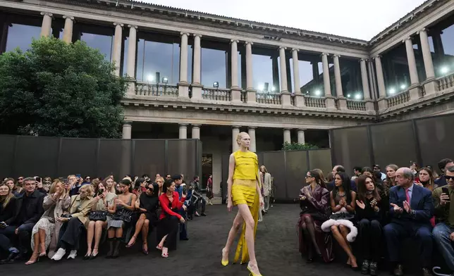 A model wears a creation part of the Ferragamo women's Spring-Summer 2026 collection, that was presented in Milan, Italy, Saturday, Sept. 27, 2025. (AP Photo/Luca Bruno).