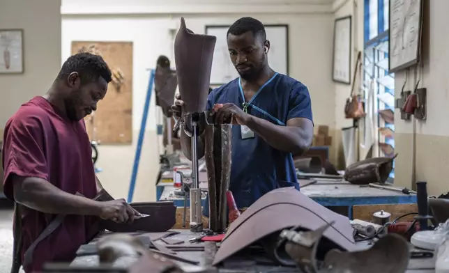 Protectics are manufactured by hand at an orthopedic center run by the Catholic church and supported by Red Cross in Goma, eastern Congo, Friday, Aug. 29, 2025. (AP Photo/Moses Sawasawa)