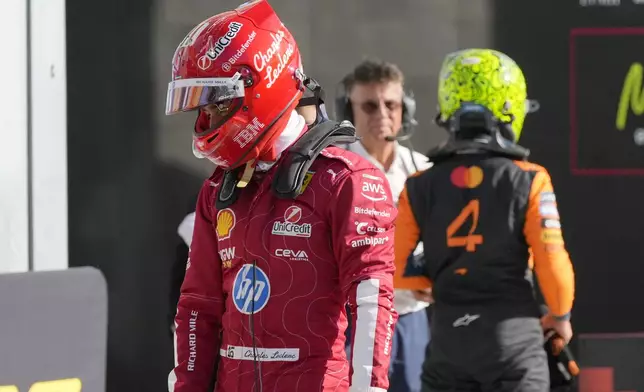 Ferrari driver Charles Leclerc of Monaco reacts after the qualifying session ahead of the Italian Grand Prix at the Monza racetrack in Monza, Italy, Saturday, Sept. 6, 2025. (AP Photo/Luca Bruno)