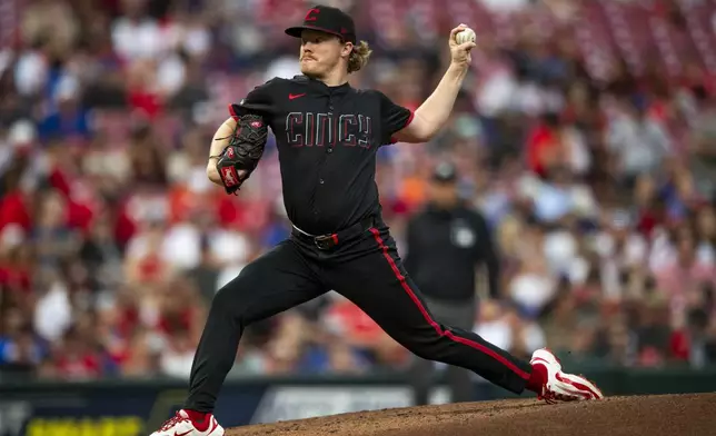 Cincinnati Reds pitcher Andrew Abbott delivers in the second inning of a baseball game against the New York Mets, Friday, Sept. 5, 2025, in Cincinnati. (AP Photo/Michael Swensen)