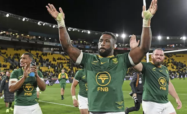 Springbok captain Siya Kolisi waves to supporters after defeating the All Blacks in their Rugby Championship test match in Wellington, New Zealand, Saturday, Sept. 13, 2025. (AP Photo/Kerry Marshall)