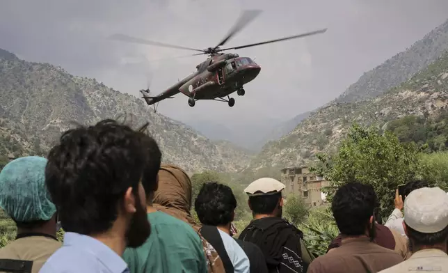 A military helicopter carrying Injured victims of an earthquake that killed many people and destroyed villages in eastern Afghanistan takes off in Mazar Dara, Kunar province, Afghanistan, Monday, Sept. 1, 2025. (AP Photo/Wahidullah Kakar)
