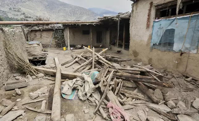 A partially collapsed house is seen in an area devastated by Sunday's powerful 6.0-magnitude earthquake that killed many people and destroyed villages in eastern Afghanistan, in Dara Noor, Kunar province, Tuesday, Sept. 2, 2025,. (AP Photo/Wahidullah Kakar)