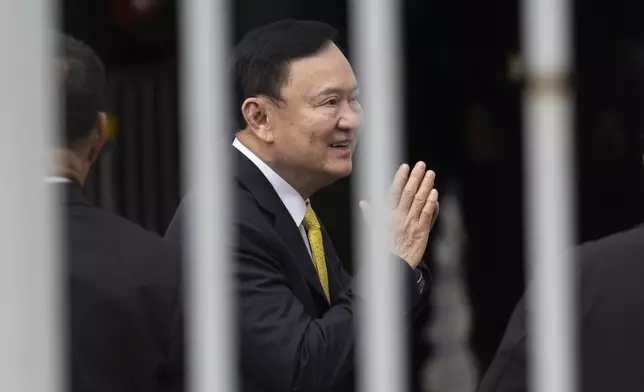Thailand's former Prime Minister Thaksin Shinawatra arrives at the Supreme Court in Bangkok, Thailand, Tuesday, Sept. 9, 2025. (AP Photo/Wason Wanitchakorn)
