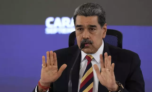 President Nicolas Maduro gives a press conference in Caracas, Venezuela, Monday, Sept. 1, 2025. (AP Photo/Ariana Cubillos)