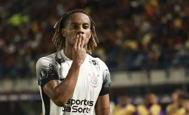 FILE - Andre Carrillo of Brazil's Corinthians celebrates scoring his side's opening goal against Venezuela's Universidad Central during a Copa Libertadores soccer match in Caracas, Venezuela, Feb. 19, 2025. (AP Photo/Jesus Vargas, File)