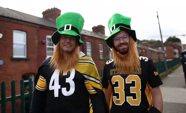 Steelers supporters arrive to watch the NFL football game between Minnesota Vikings and Pittsburgh Steelers at Croke Park stadium in Dublin, Sunday, Sept. 28, 2025.(AP Photo/Peter Morrison)