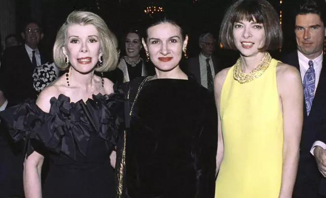 FILE - Joan Rivers, Paloma Picasso and Vogue editor Anna Wintour attend a benefit dinner for the American Suicide Foundation at the Waldorf Astoria in New York on May 3, 1991. (AP Photo/Luiz Ribeiro, File)
