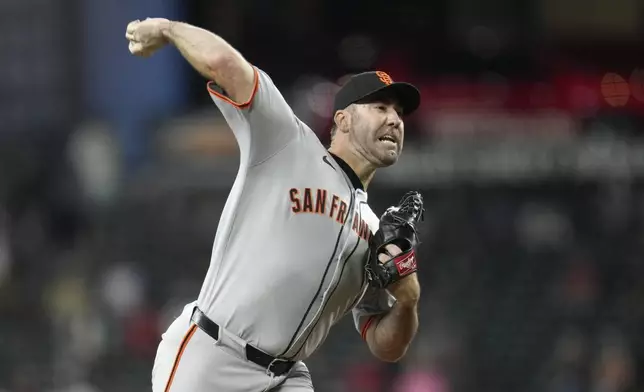 San Francisco Giants starting pitcher Justin Verlander throws against the Arizona Diamondbacks during the first inning of a baseball game Wednesday, Sept. 17, 2025, in Phoenix. (AP Photo/Ross D. Franklin)