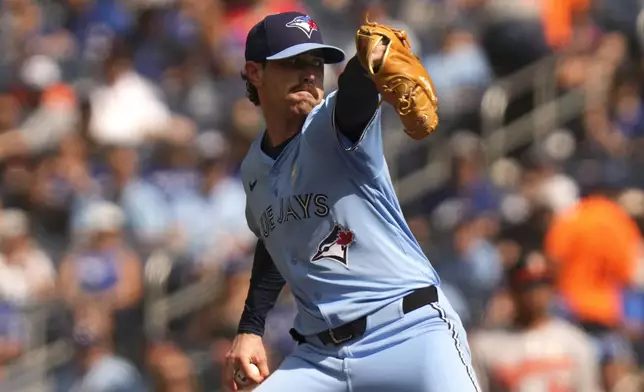 Toronto Blue Jays pitcher Shane Bieber works against the Baltimore Orioles during first-inning baseball game action in Toronto, Sunday, Sept. 14, 2025. (Chris Young/The Canadian Press via AP)