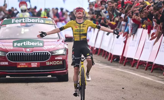Danish rider Jonas Vingegaard, from Visma | Lease a Bike team wins the ninth stage of La Vuelta from Alfaro to Valdezcaray, Spain, Sunday, Aug. 31, 2025. (AP Photo/Miguel Oses)