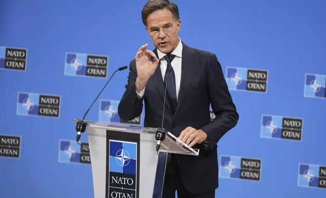 NATO Secretary General Mark Rutte speaks during a media conference at NATO headquarters in Brussels, Tuesday, Sept. 23, 2025. (AP Photo/Virginia Mayo)