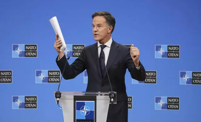 NATO Secretary General Mark Rutte speaks during a media conference at NATO headquarters in Brussels, Tuesday, Sept. 23, 2025. (AP Photo/Virginia Mayo)