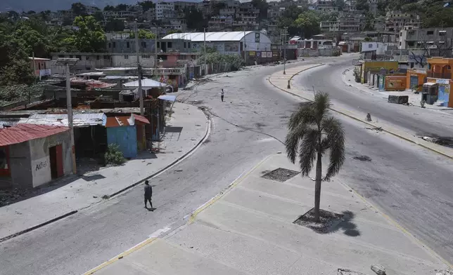 A main street is empty due to insecurity in the Delmas neighborhood of Port-au-Prince, Haiti, Tuesday, Sept. 2, 2025. (AP Photo/Odelyn Joseph)