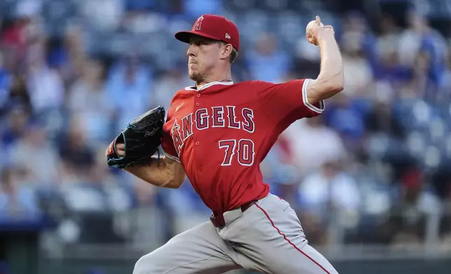 Los Angeles Angels starting pitcher Mitch Farris throws as he makes his major league debut during the first inning of a baseball game against the Kansas City Royals, Tuesday, Sept. 2, 2025, in Kansas City, Mo. (AP Photo/Charlie Riedel)