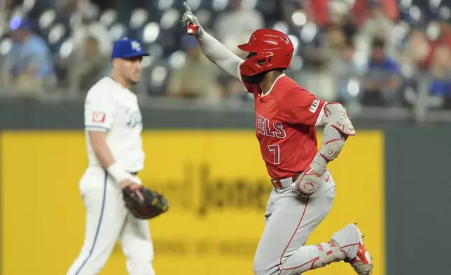 Los Angeles Angels' Jo Adell (7) runs the bases after hitting a solo home run during the sixth inning of a baseball game Tuesday, Sept. 2, 2025, in Kansas City, Mo. (AP Photo/Charlie Riedel)