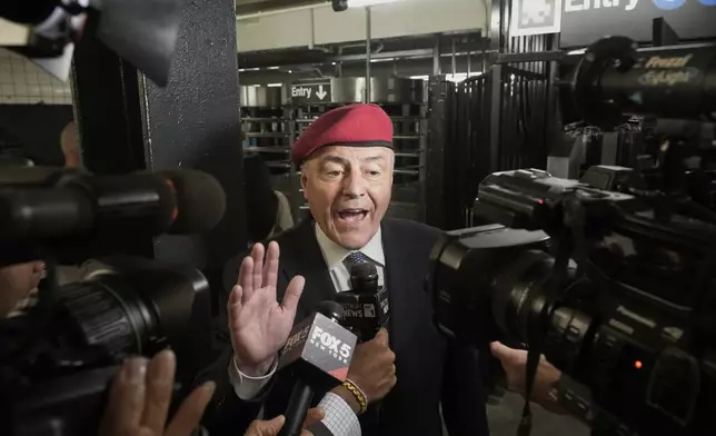 New York City mayoral candidate Curtis Sliwa is interviewed in a subway entrance as he campaigns, in New York, Monday, Aug. 18, 2025. (AP Photo/Richard Drew)