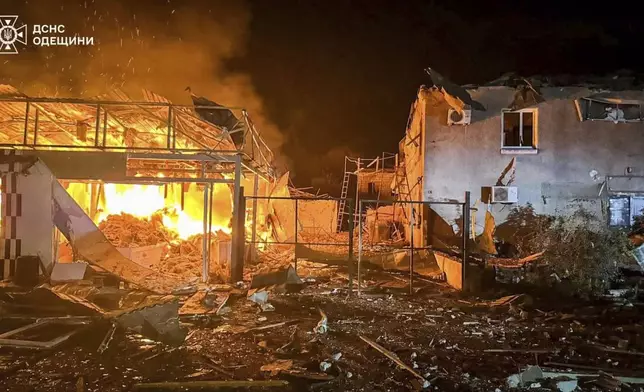 In this photo provided by the Ukrainian Emergency Service, the fire following a Russian missile attack is seen in Tatarbunary, Odesa region, Ukraine, Tuesday, Sept. 23, 2025. (Ukrainian Emergency Service via AP)