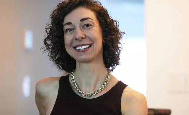 Thriller novelist Andrea Bartz is photographed in her home, in the Brooklyn borough of New York, Thursday, Sept. 4, 2025 (AP Photo/Richard Drew)