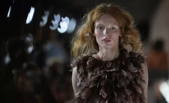 A model wears a creation by Russian designer Alena Akhmadullina on a runway at Moscow Fashion Week in Moscow, Tuesday, Sept. 2, 2025. (AP Photo/Pavel Bednyakov)