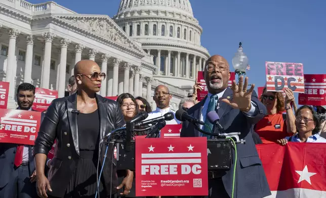 Rep. Ayanna Pressley, D-Mass., left, and Rep. Glenn Ivey, D-Md., center, join elected officials and activists in a call to end the presence of National Guard troops in the District of Columbia at the Capitol in Washington, Thursday, Sept. 4, 2025. (AP Photo/J. Scott Applewhite)