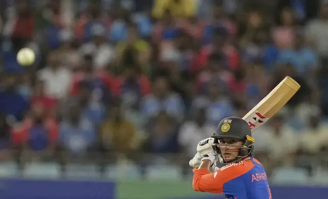 India's Abhishek Sharma plays a shot during the Asia Cup cricket match between India and Pakistan at Dubai International Cricket Stadium, United Arab Emirates, Sunday, Sept. 21, 2025. (AP Photo/Altaf Qadri)