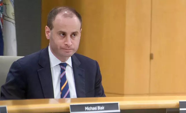 National Capital Planning Commission Chairman Will Scharf presides over a National Capital Planning Commission meeting, Thursday, Sept. 4, 2025, in Washington. (AP Photo/Rod Lamkey, Jr.)