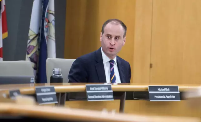 National Capital Planning Commission Chairman Will Scharf presides over a National Capital Planning Commission meeting, Thursday, Sept. 4, 2025, in Washington. (AP Photo/Rod Lamkey, Jr.)
