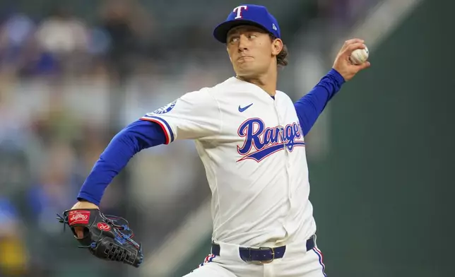 Texas Rangers starting pitcher Jacob Latz throws against the Milwaukee Brewers during the first inning of a baseball game Monday, Sept. 8, 2025, in Arlington, Texas. (AP Photo/Julio Cortez)