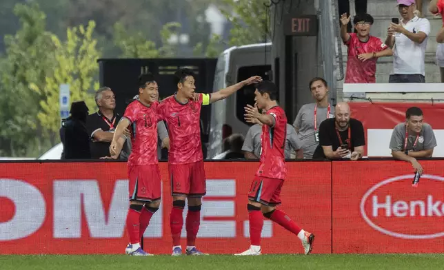 South Korea's Son Heung-min, center, celebrates his goal with team mates during a friendly soccer match against United States at Sport Illustrator Stadium on Saturday, Sept. 6, 2025, in Harrison, N.J. (AP Photo/Andres Kudacki)