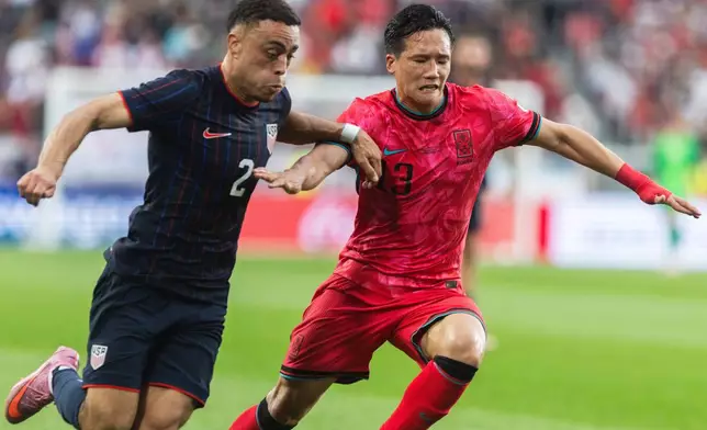 United States' Sergino Dest, left, battles for the ball against South Korea's Lee Tae-seok, right, during a friendly soccer match at Sport Illustrator Stadium on Saturday, Sept. 6, 2025, in Harrison, N.J. (AP Photo/Andres Kudacki)