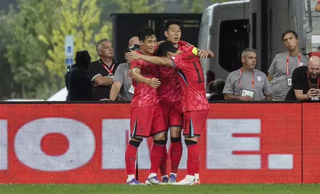 South Korea's Son Heung-min, center, celebrates his goal with team mates during a friendly soccer match against United States on Saturday, Sept. 6, 2025, in Harrison, N.J. (AP Photo/Andres Kudacki)